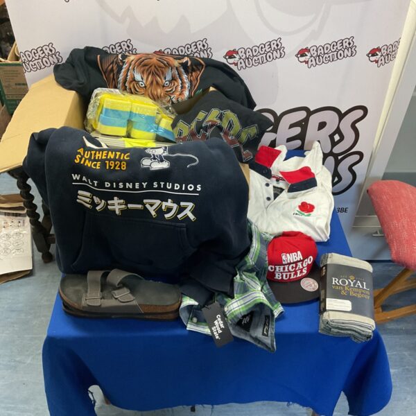 Mixed clothing lot with Disney hoodie, Chicago Bulls cap and rugby shirt.
