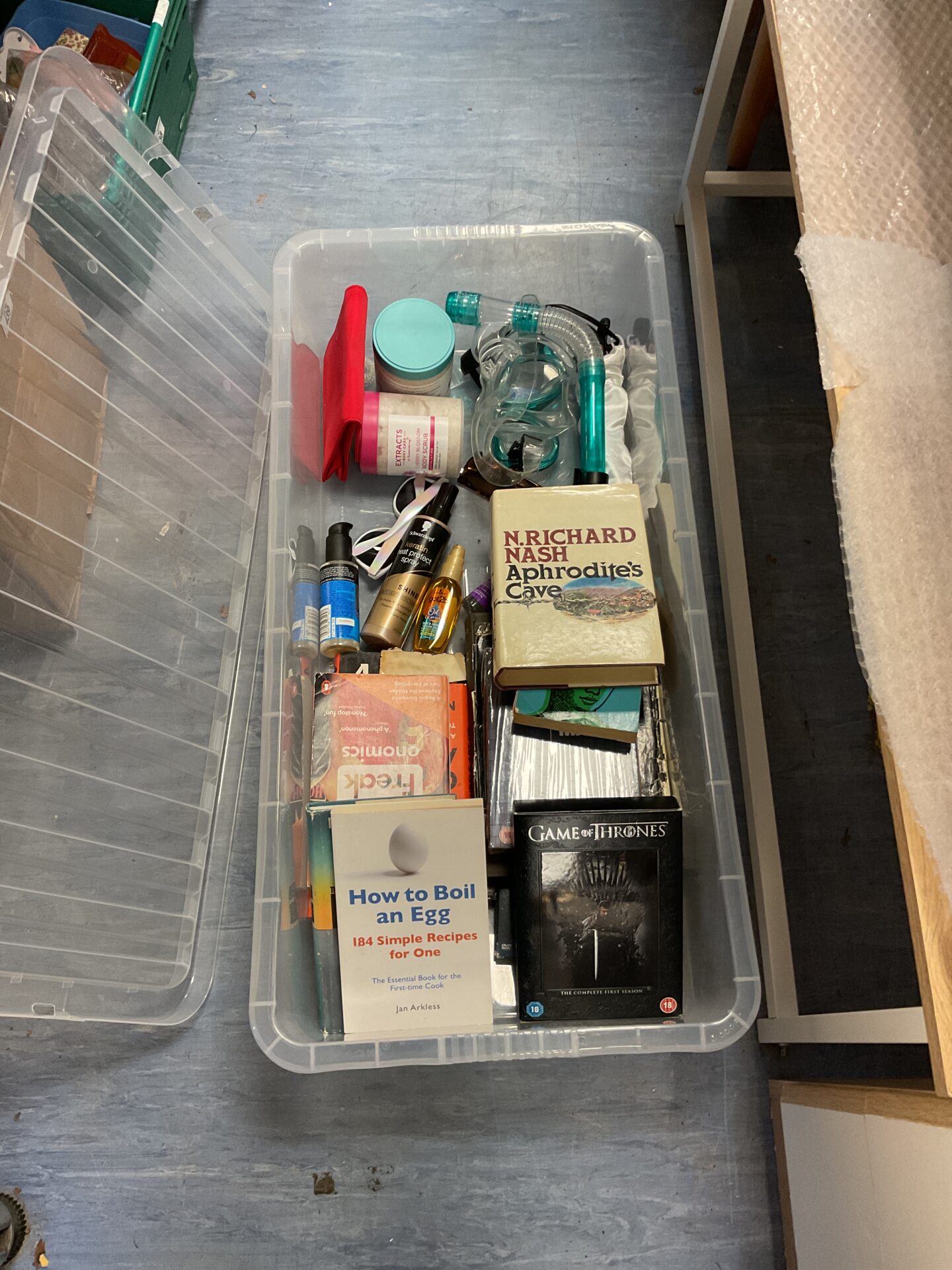 457 Tray of books & cosmetics including game of thrones dvd boxset