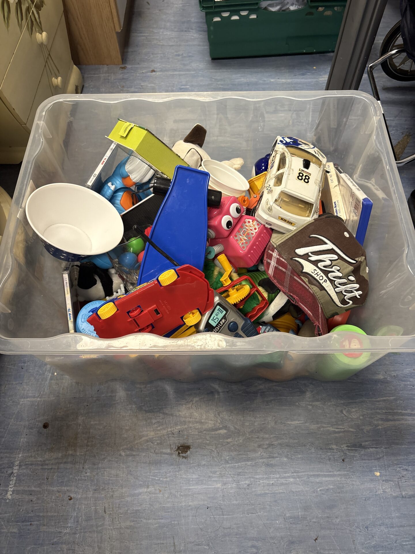 387 Box of mixed toys inc thrift shop and PlayStation 2 fifa game