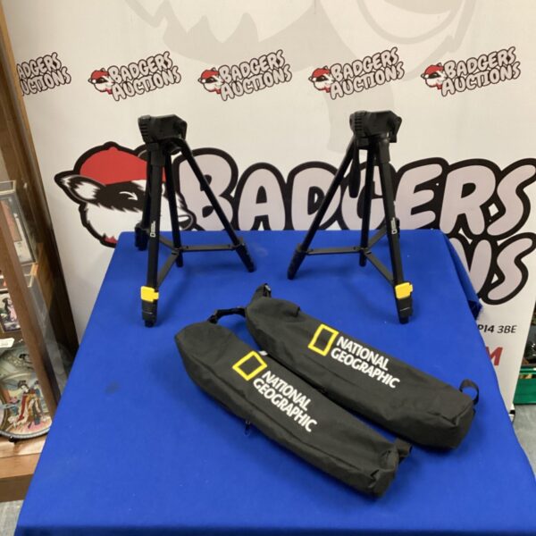 Two National Geographic tripods presented as a lot.