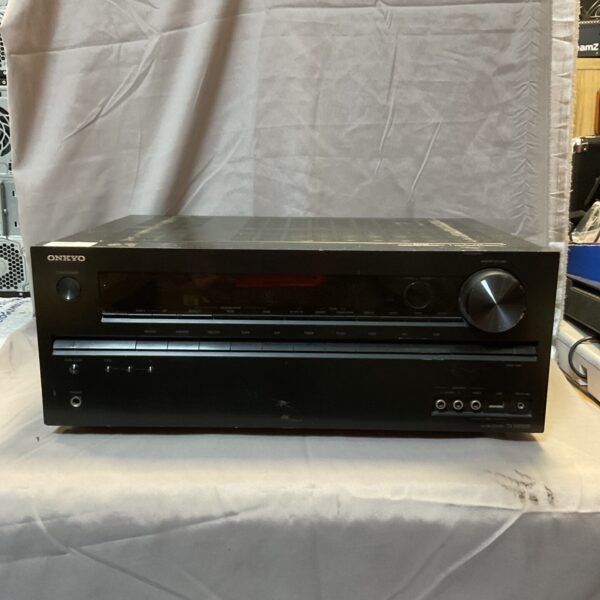 Onkyo TX-NR509 AV receiver front view, vintage home theater equipment.