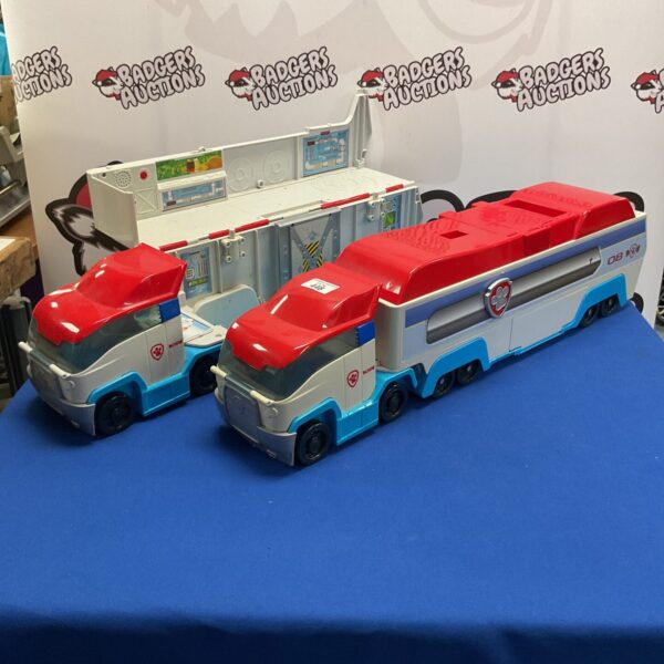 Two bright red Paw Patrol trucks, model 08, for kids.