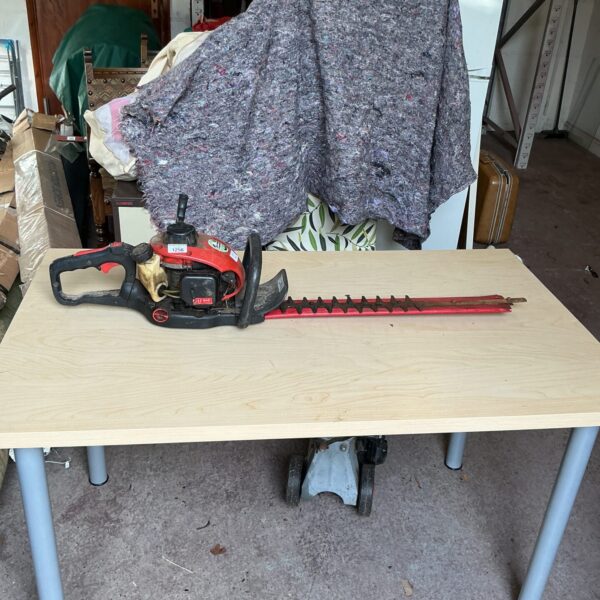 Used petrol hedge cutter for garden landscaping and maintenance.
