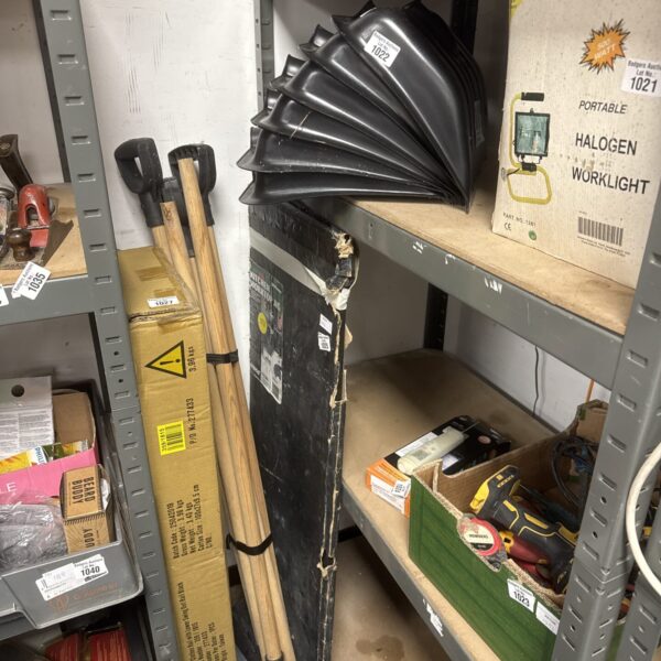 Lot of six plastic snow shovel heads and handles for winter use.