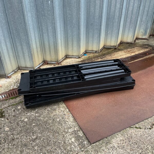 Durable plastic workshop shelving unit for garage storage.