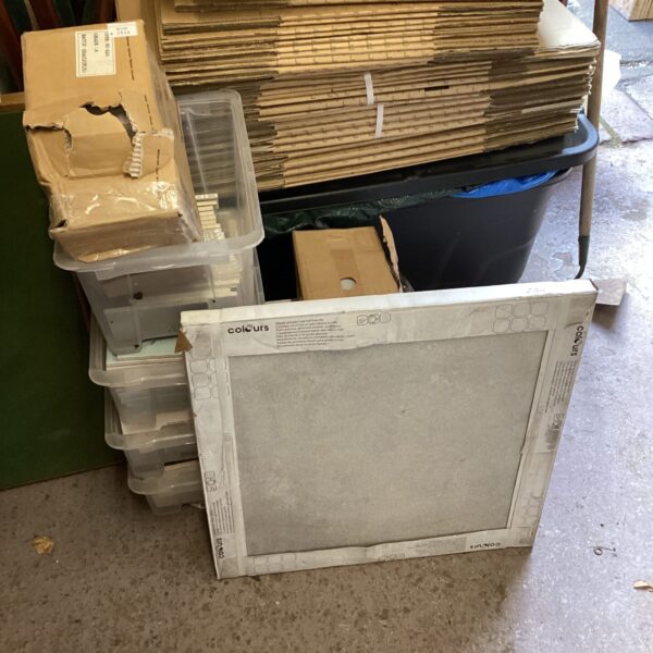 Bundle of glazed porcelain wall and floor tiles for home renovation.
