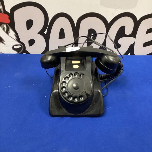 Vintage PTT rotary phone in used condition.