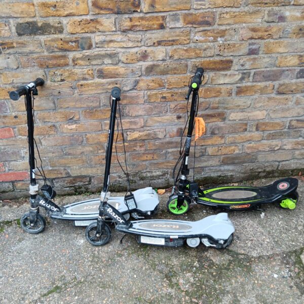 Three Razor electric scooters presented as a lot.