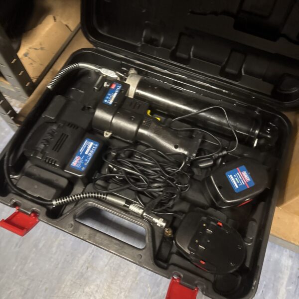 Sealey 12v cordless grease gun in its original carry case.