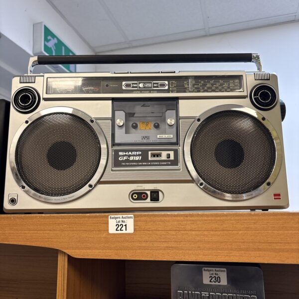 Vintage Sharp GF-9191 boombox with cassette player and radio.
