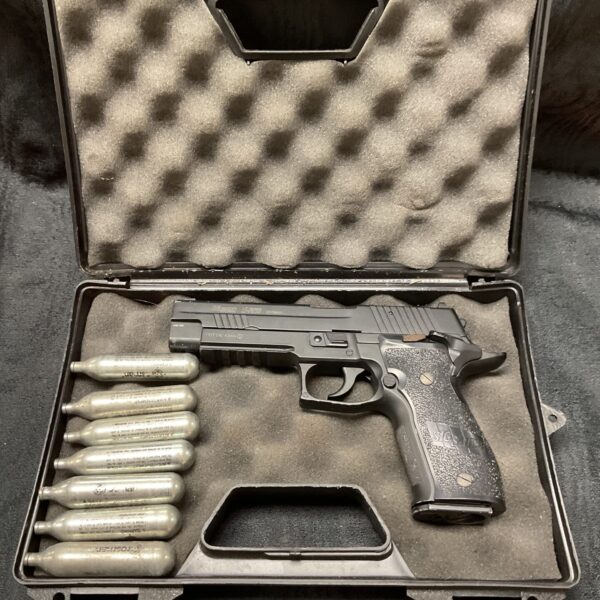 Sig Sauer Co2 pistol set with spare cylinders for airgun enthusiasts.