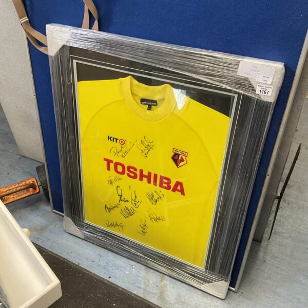 Framed signed Watford FC football shirt for collectors.