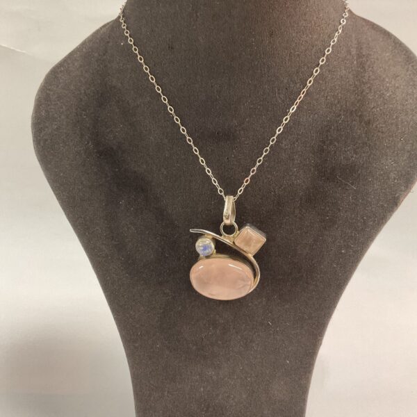 Vintage silver pendant necklace with three stones.