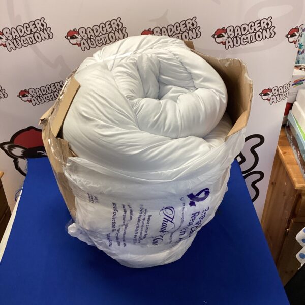 Kingsize Sleepworks duvet, showing signs of use.
