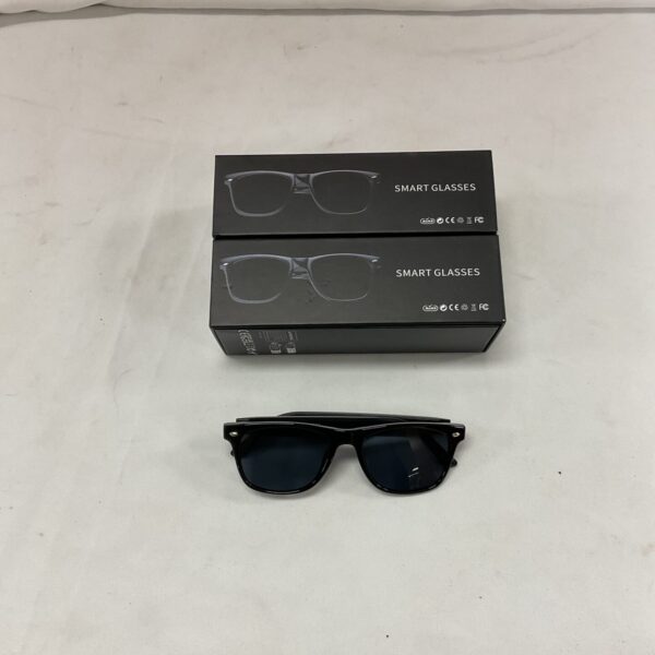 Two pairs of smart glasses, showcasing early wearable technology.