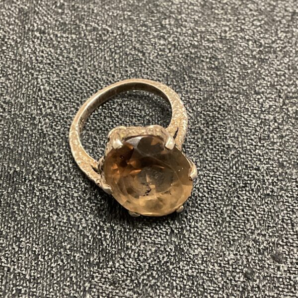 Close-up of a 925 silver ring with a smokey quartz stone.