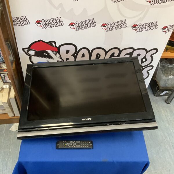Sony KDL-32V4000 LCD television with remote control.