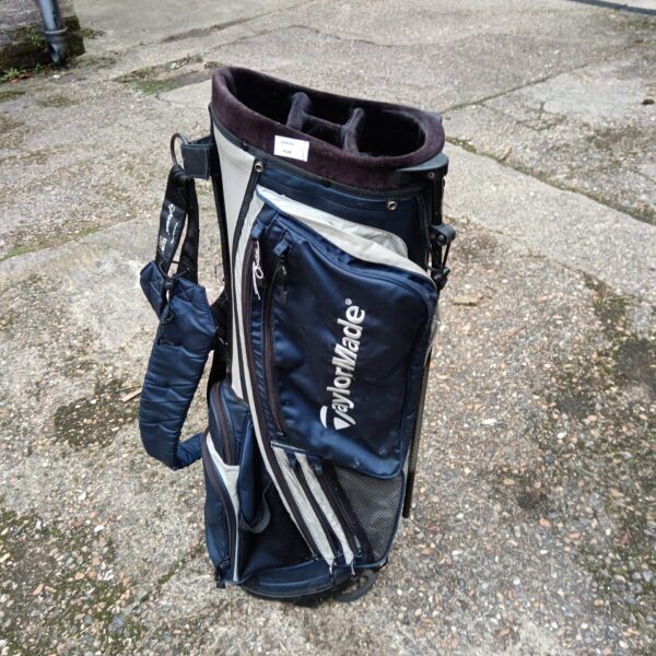 Navy blue TaylorMade golf bag with white accents.
