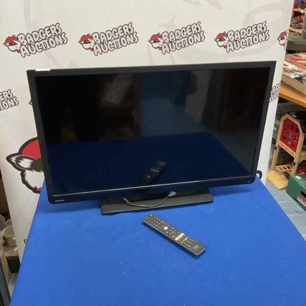 Toshiba 32 inch LCD TV model 32D3453DB with remote control.