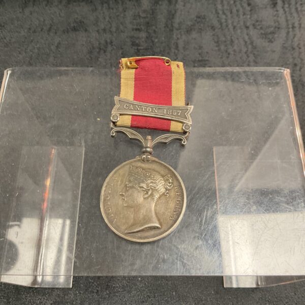 Antique Victoria China Medal with Canton 1857 bar, front view.