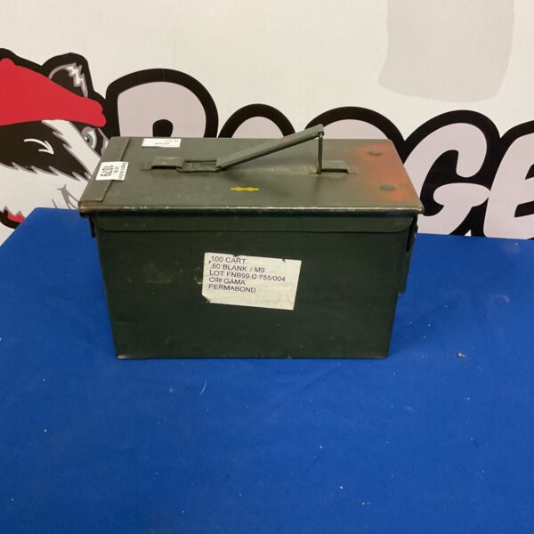 Vintage metal ammo crate with hinged lid.