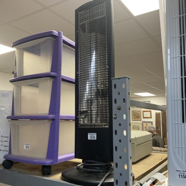 Vintage black tower heater, a classic heating appliance.