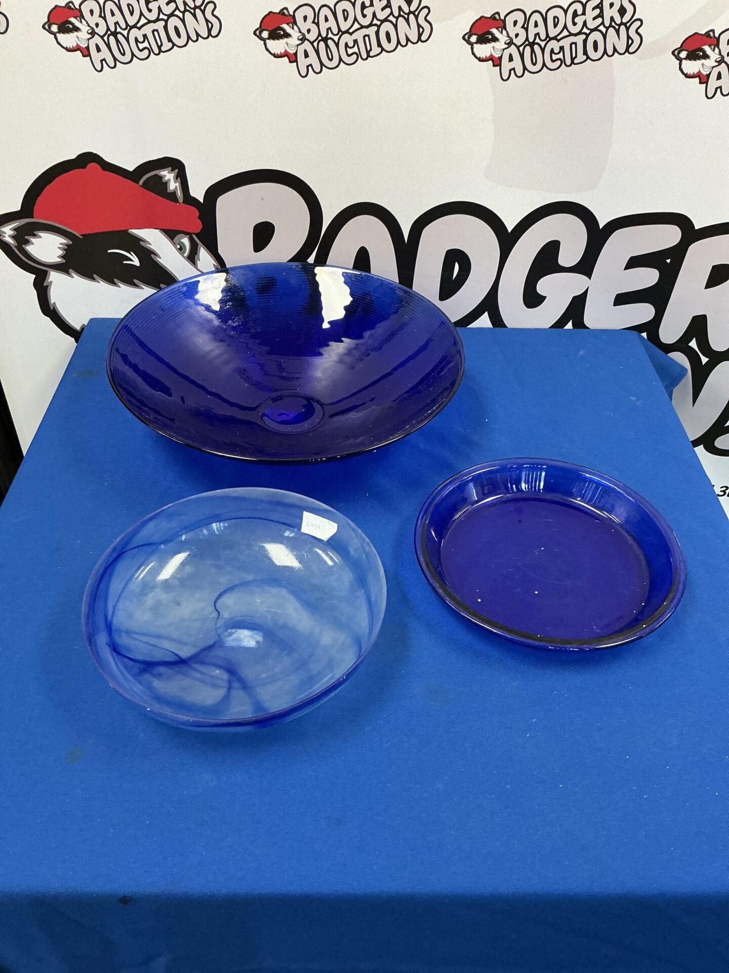 383 Three cobalt blue glass bowls