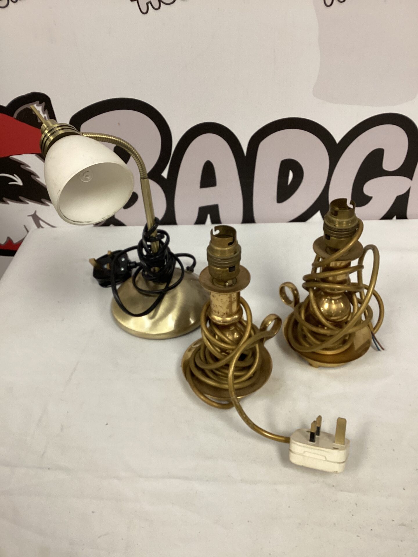 704 Three brass table lamps