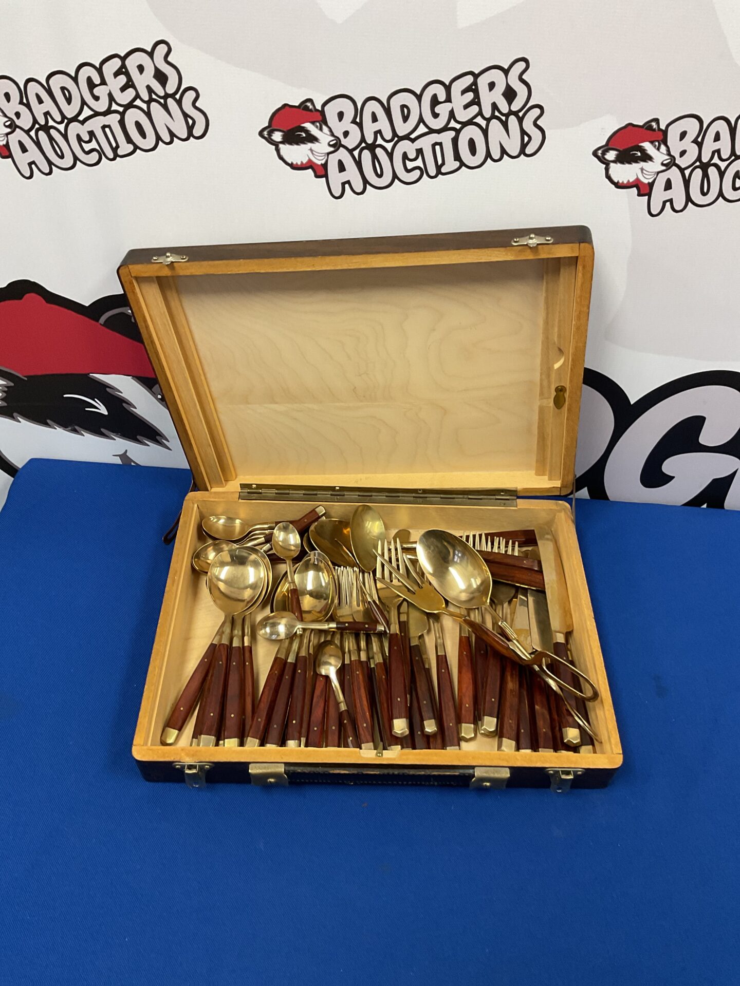 067 Vintage set of wooden handled bronze cutlery