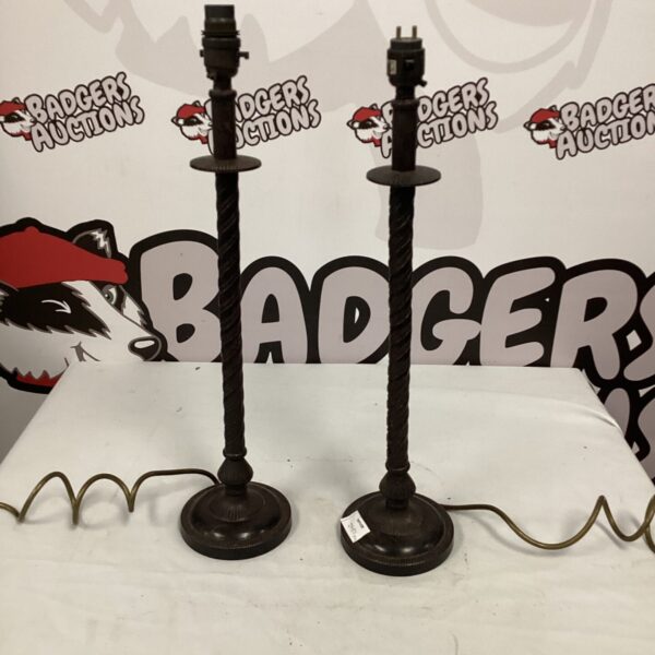 Pair of vintage bronzed table lamps with twist stems.