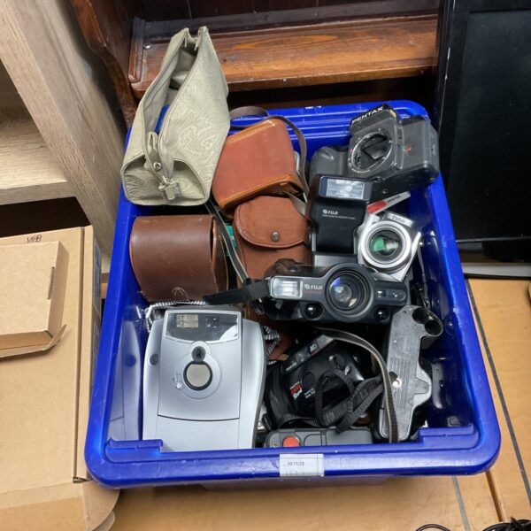 Vintage camera lot including Polaroid, Pentax, and Fuji cameras.