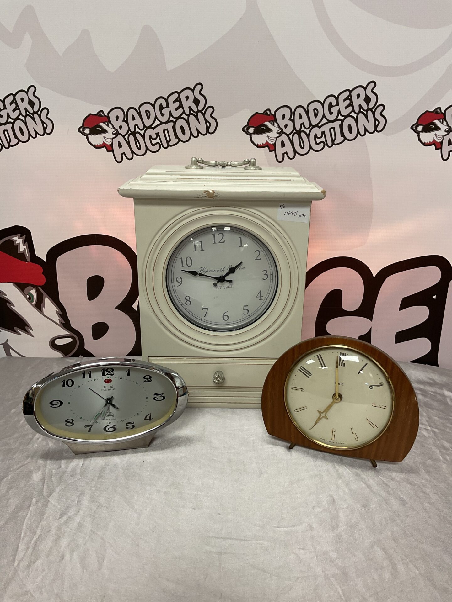010 Three clocks including smiths, five rams & hepworth & son