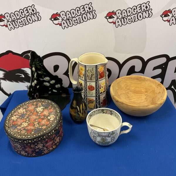 Vintage decorated papier mache box with household items.