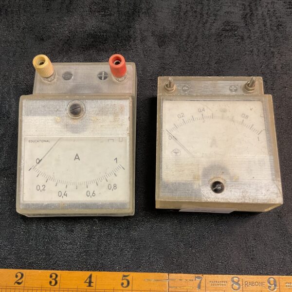 Vintage educational electrical meter for science training.