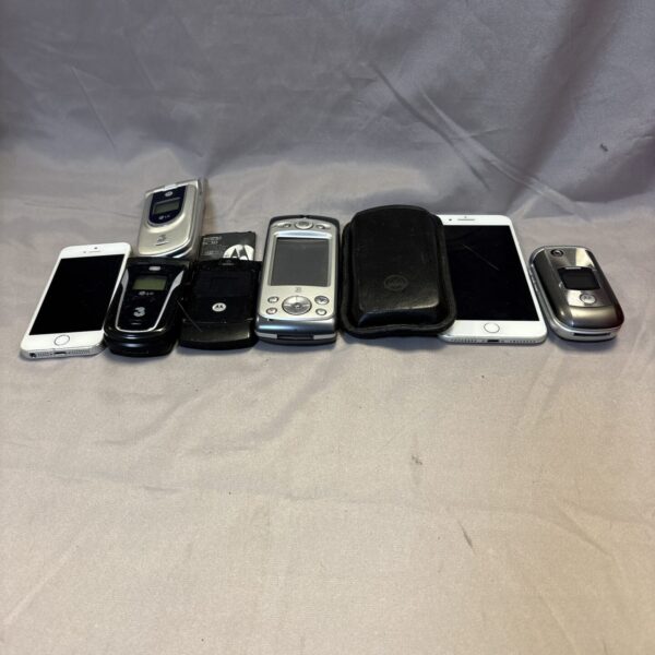 Vintage mobile phone lot with various retro handsets.