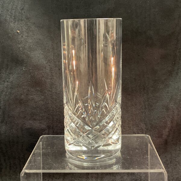 Vintage Whitefriars glass tumblers on a clear stand.
