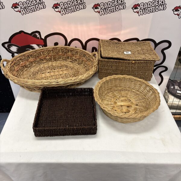 Selection of vintage wicker baskets for storage and display.