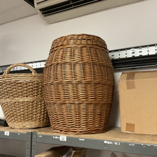 Large wicker Ali Baba laundry basket for storage.