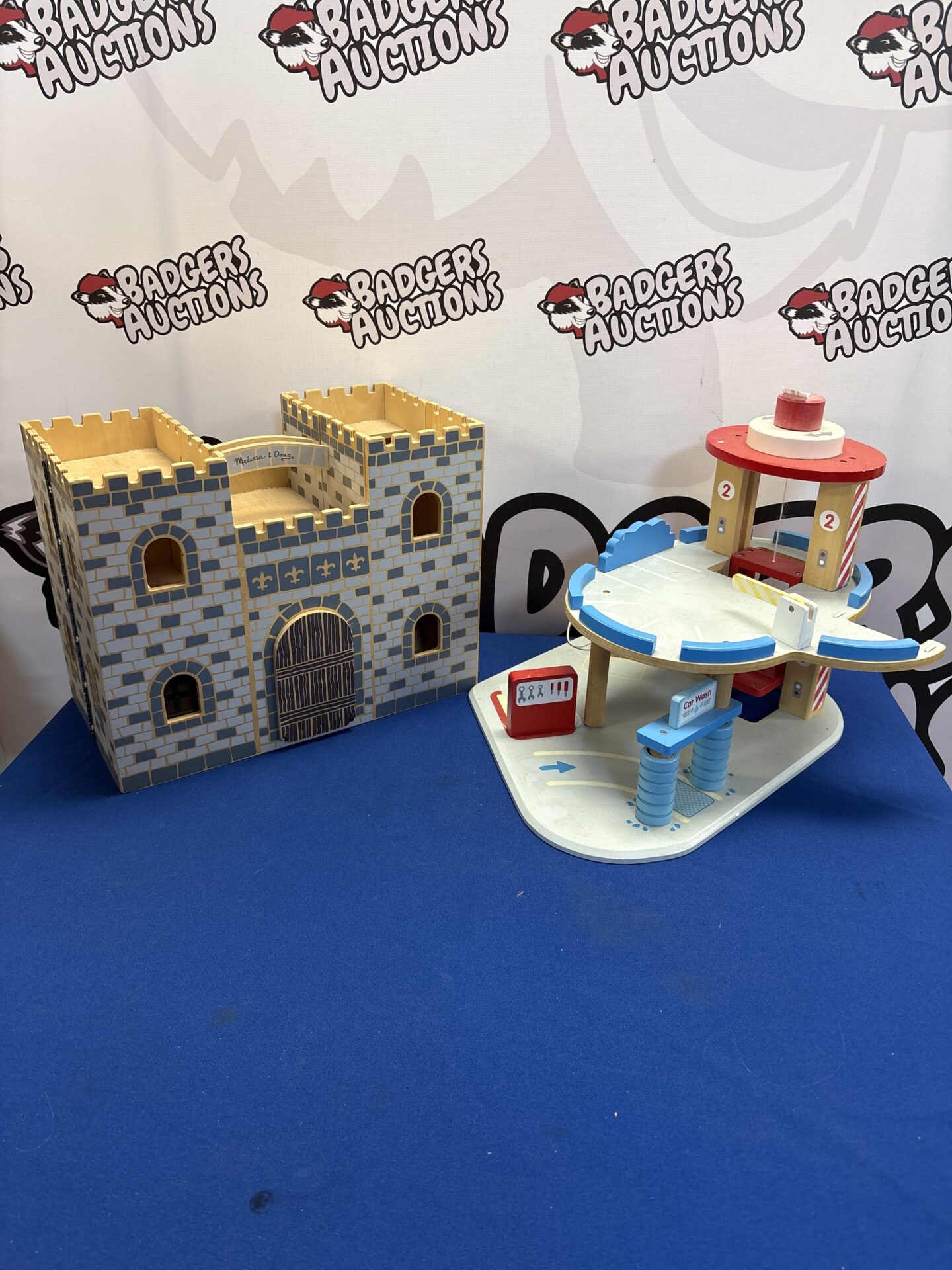 380 Two wooden playsets inc car park and open up car park