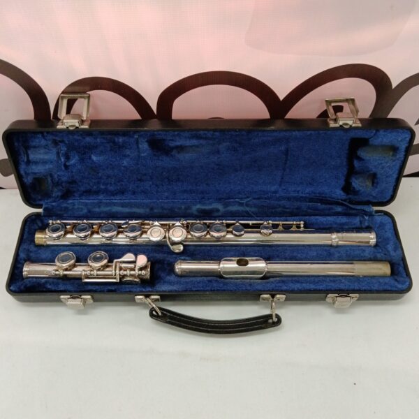 Silver-plated W T Armstrong flute in open case.
