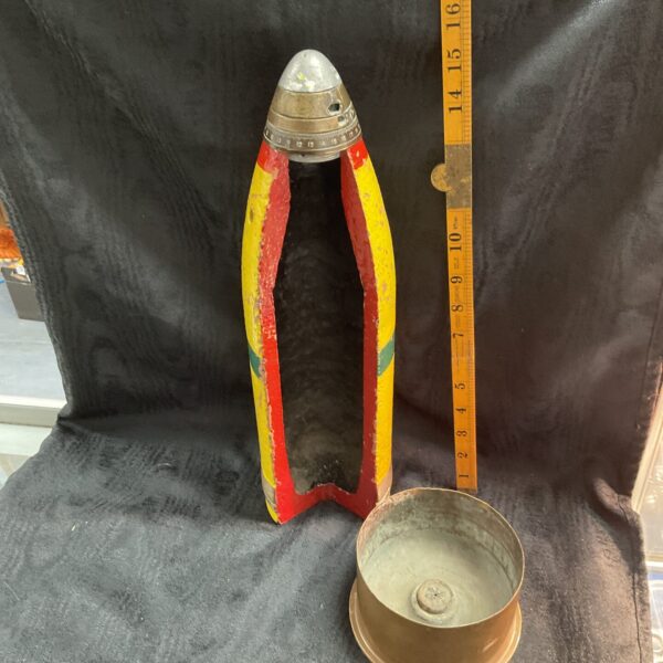 WWI cutaway cannon shell with brass base, military collectable.