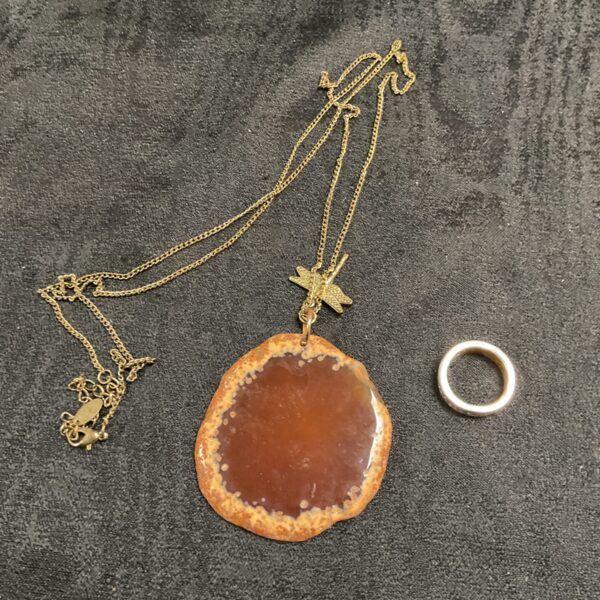 Vintage agate pendant necklace with dragonfly charm and silver ring.