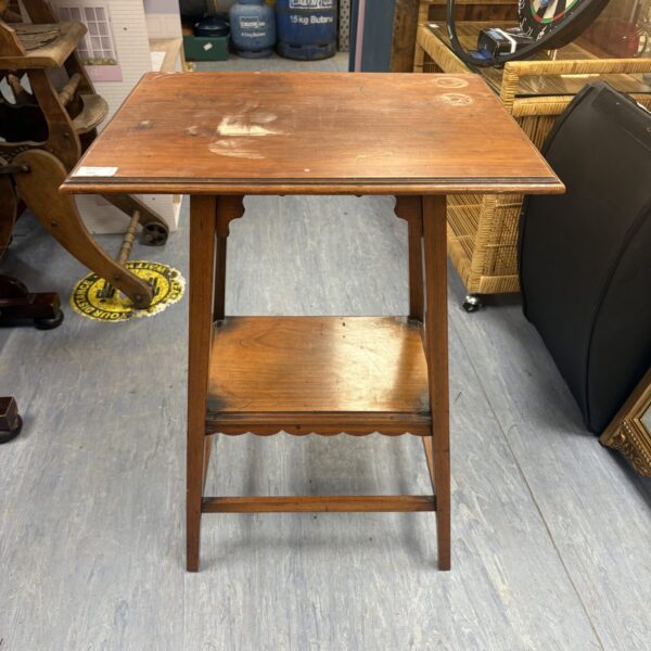 Antique Arts and Crafts mahogany lamp table with shelf.
