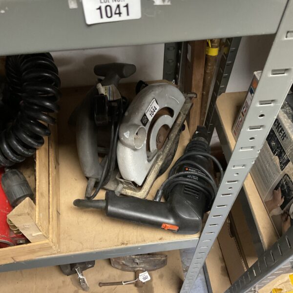 Black & Decker circular saw and drill in a workshop setting.