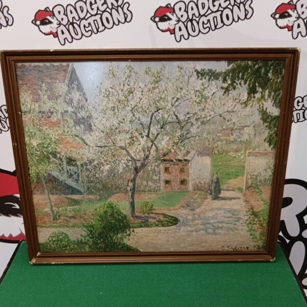 Vintage Camile Pissaro print of blossoming plum trees in a framed artwork.