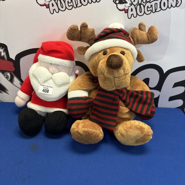 Vintage Christmas soft toys featuring Santa Claus and a reindeer.