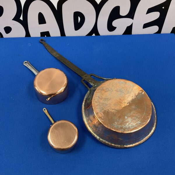 Vintage copper pans set including Mauviel 1830 saucepan.