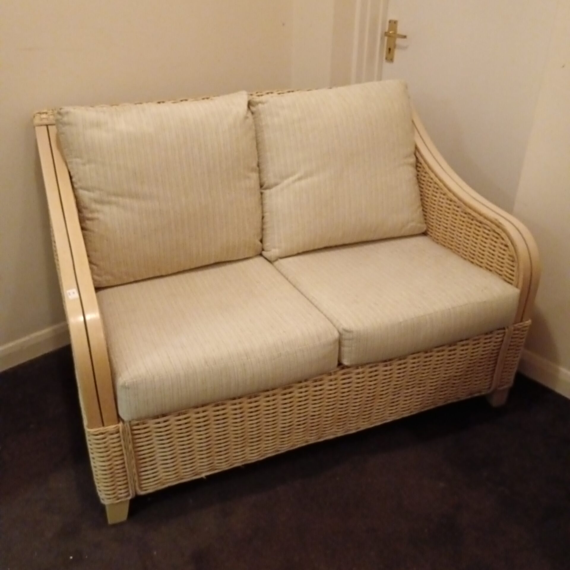 648 Two seater cream rattan sofa