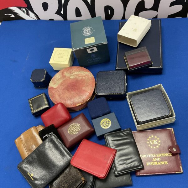 Assorted empty jewellery and watch wallets and boxes in a lot.