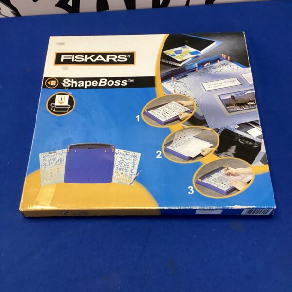 Fiskars Shape Boss 560 crafting tool in its original packaging.